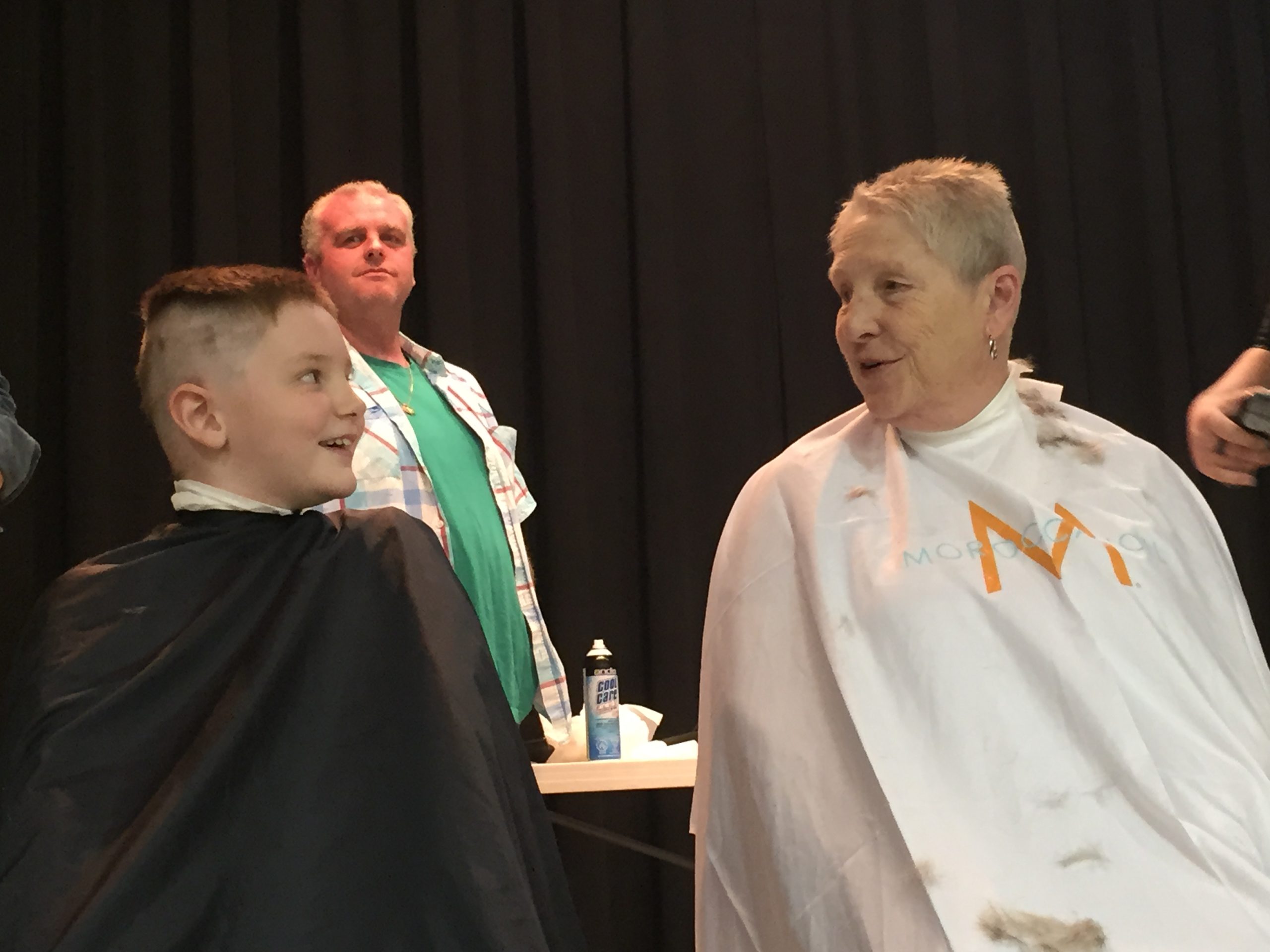 Stephen Lynch and his nan, Eileen Smith, a cancer survivor of over 20 years, in their chairs about to get their heads shaved