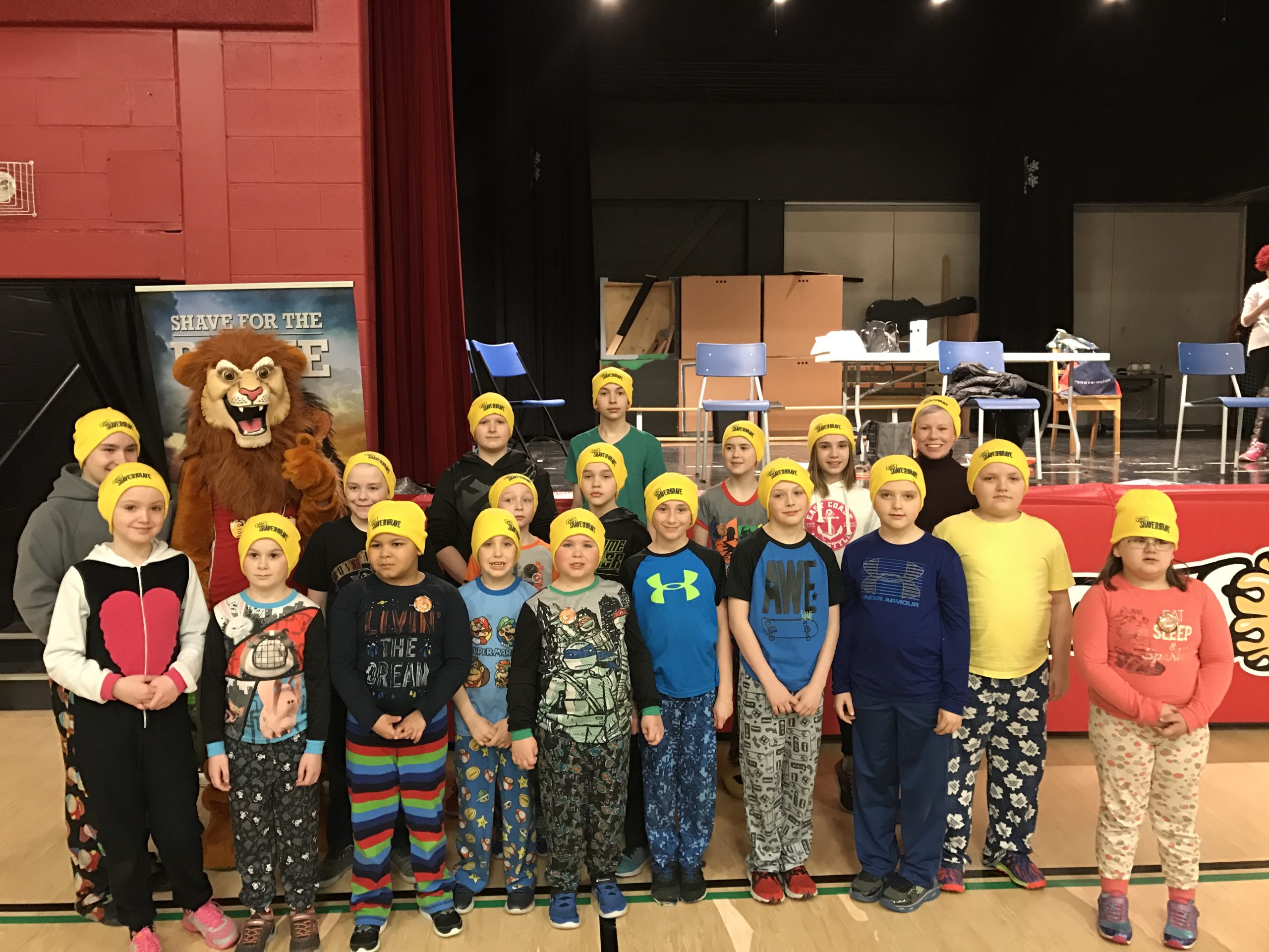 19 shavers posing after a successful shave!