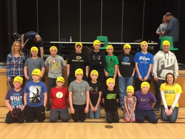 16 shavers posing together after a successful shave!